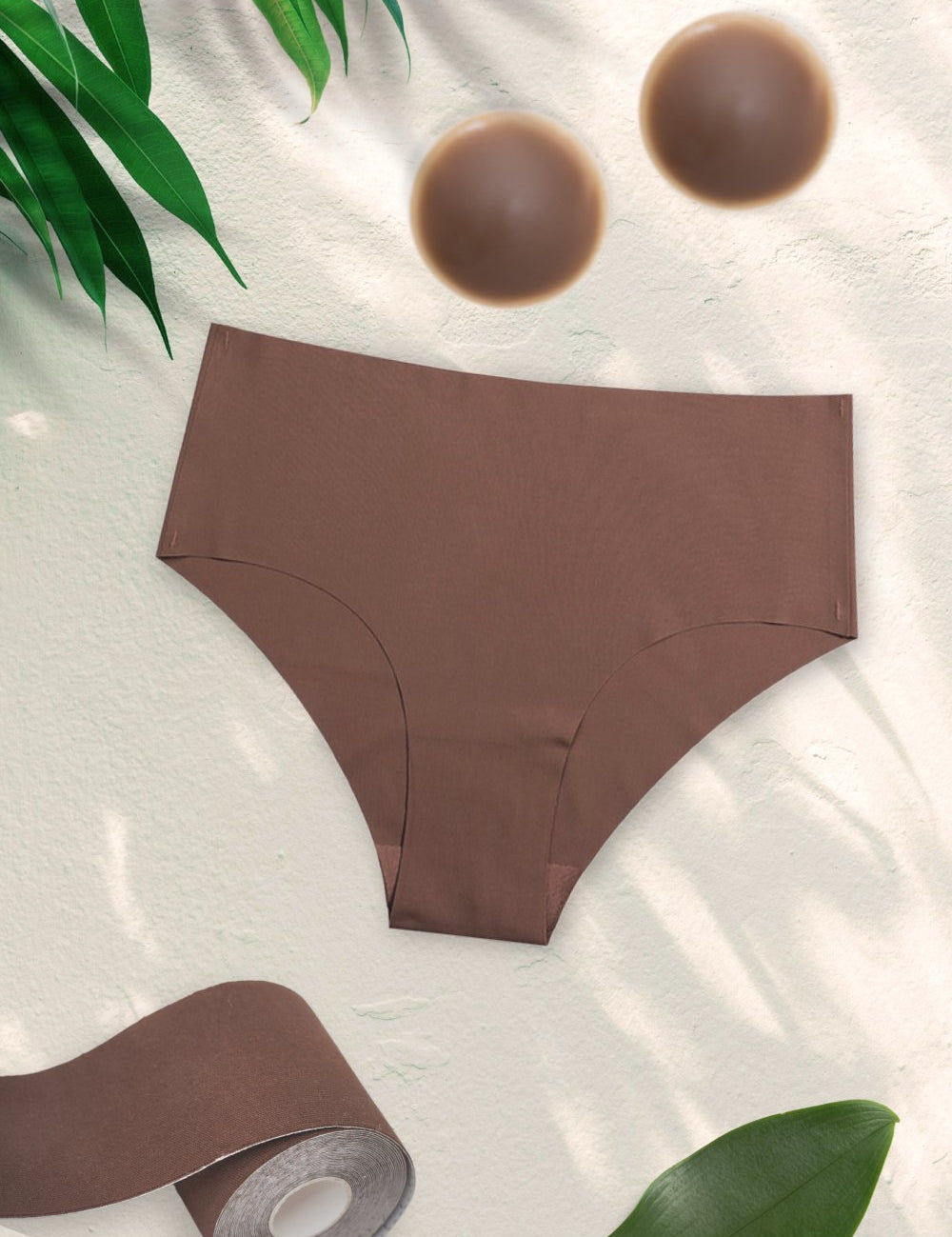 Seamless silk briefs, with nipple covers, and boob tape for dark skin women in the color dark coffee.