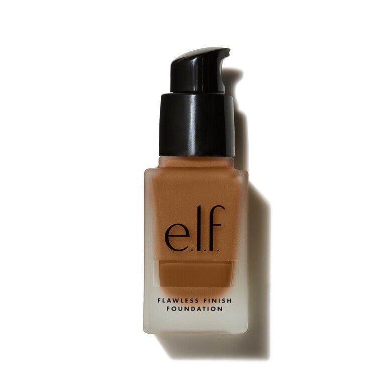 A bottle of semi-matte satin foundation by e.l.f. cosmetics in the color nutmeg for neutral undertones for medium brown skin.