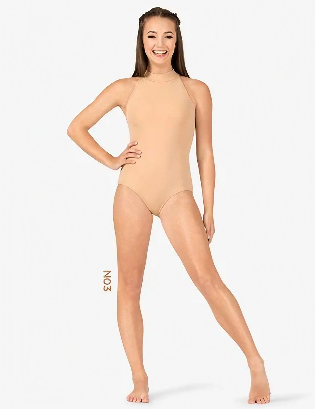 A young girl elegantly dressed in a tan high neck tank leotard