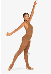 A young Black dancer is posing in brown stirrup dance tights.