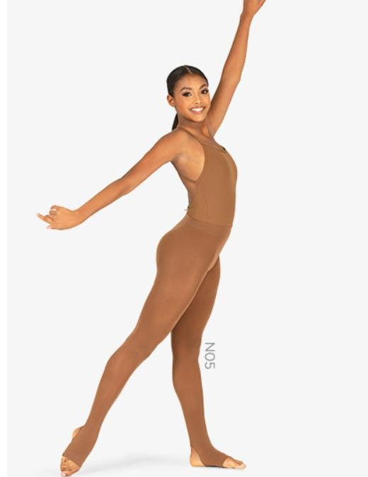 A young Black dancer is posing in brown stirrup dance tights.